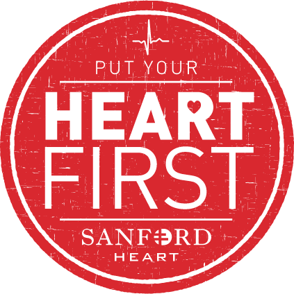红色的圆圈标志写着:把你的心放在第一位。桑福德的心。
